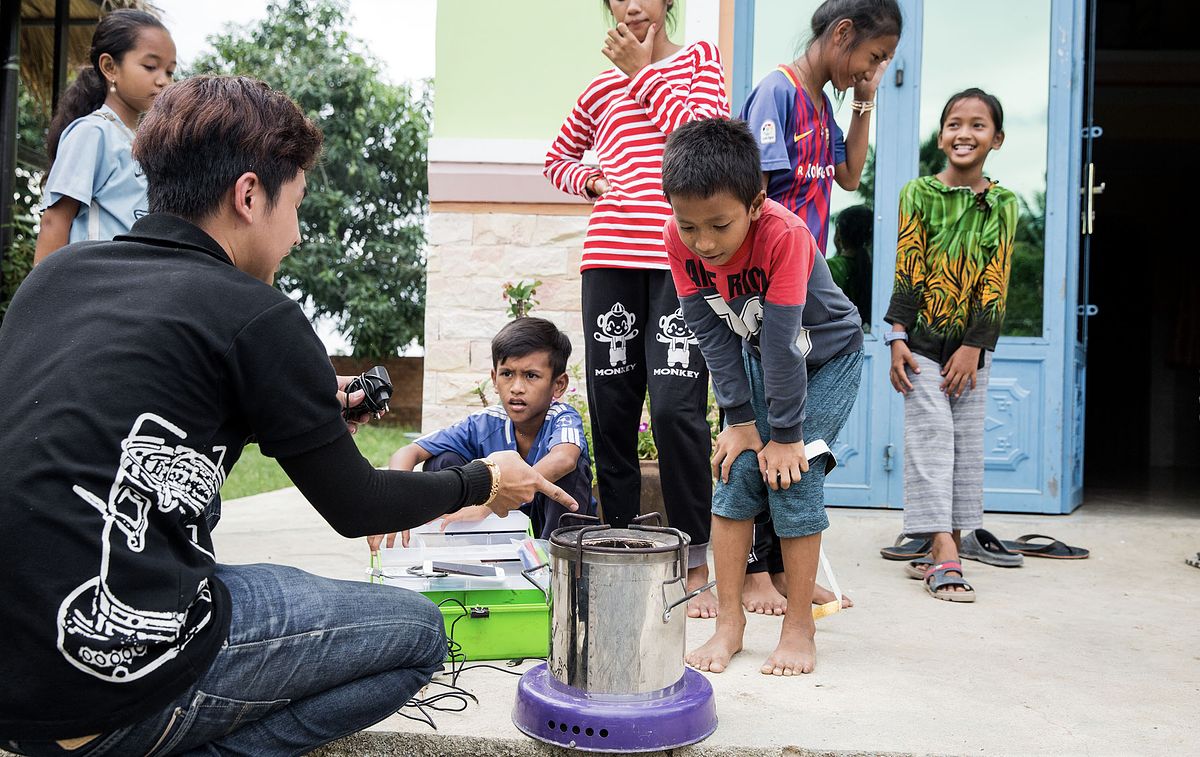 People using the ACE1 Cookstove